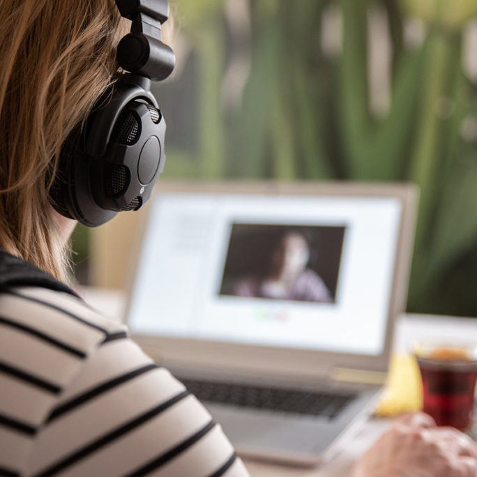 Home office. Woman working at home doing video chat.